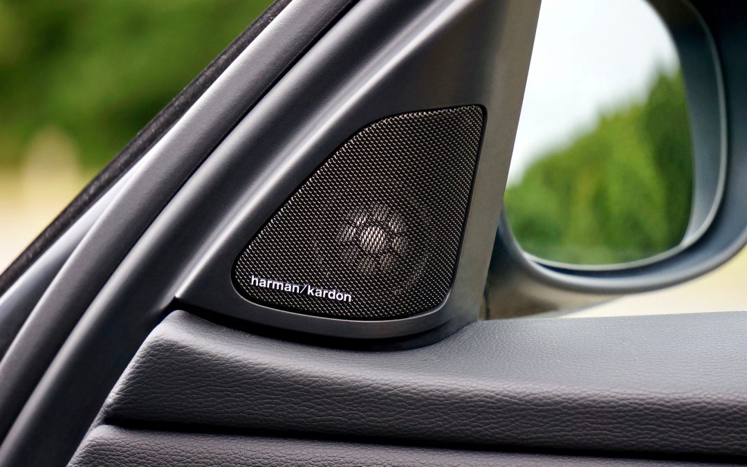 bluetooth car speaker placed near at the side mirror